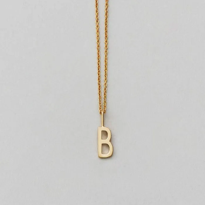 Charm lettera oro