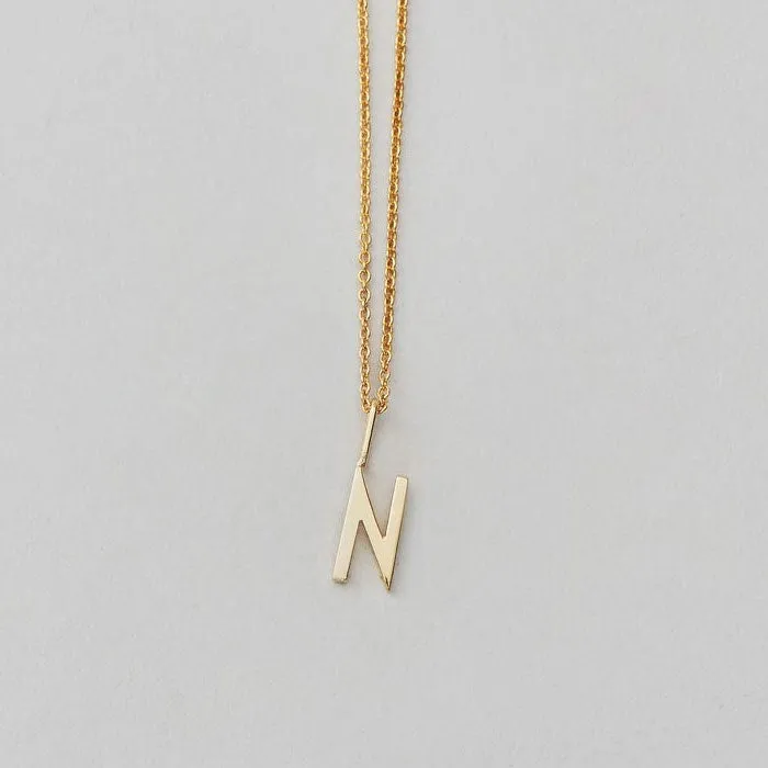 Charm lettera oro