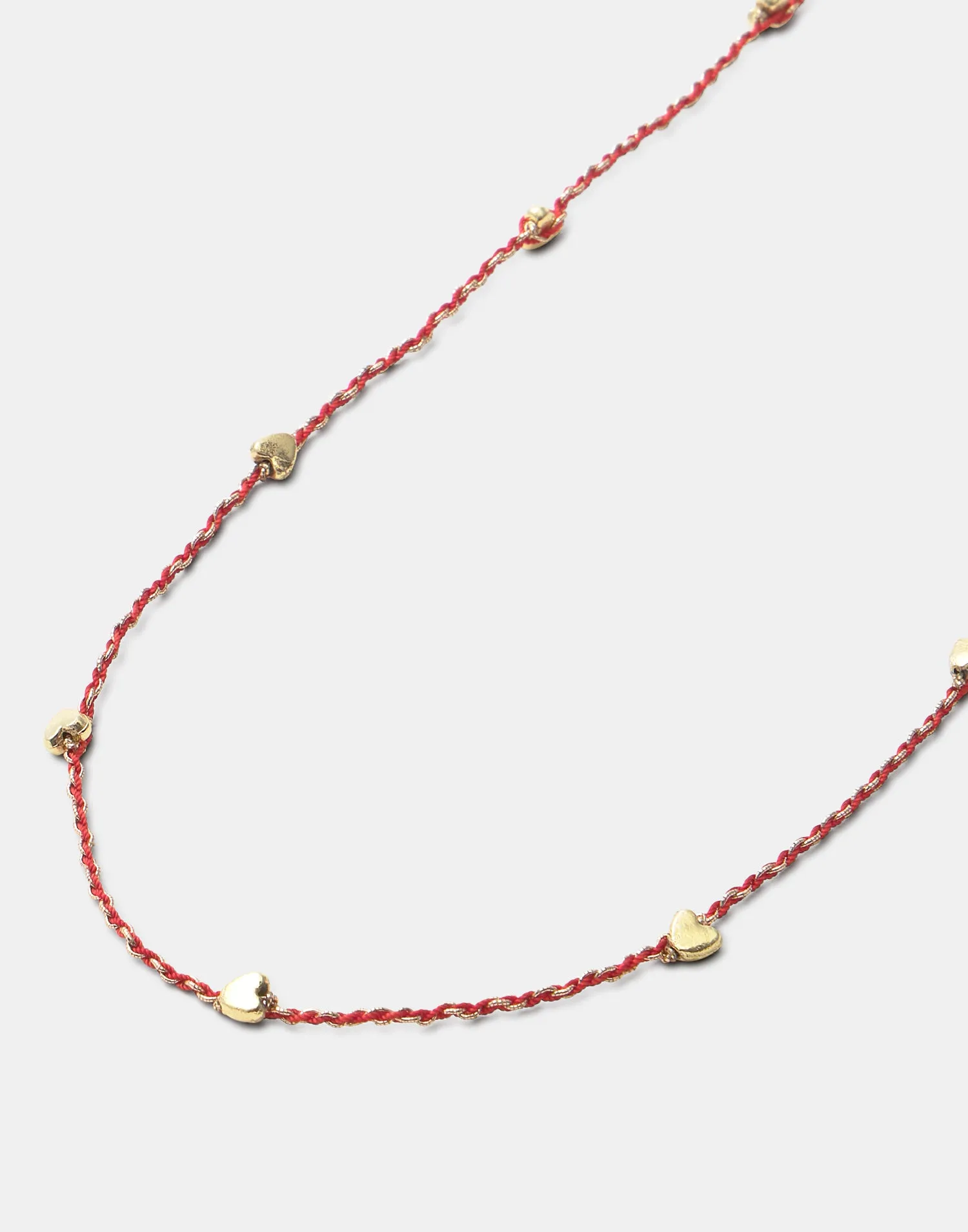 Collar largo hilo corazones